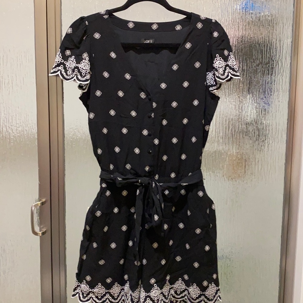 Black romper with embroidery